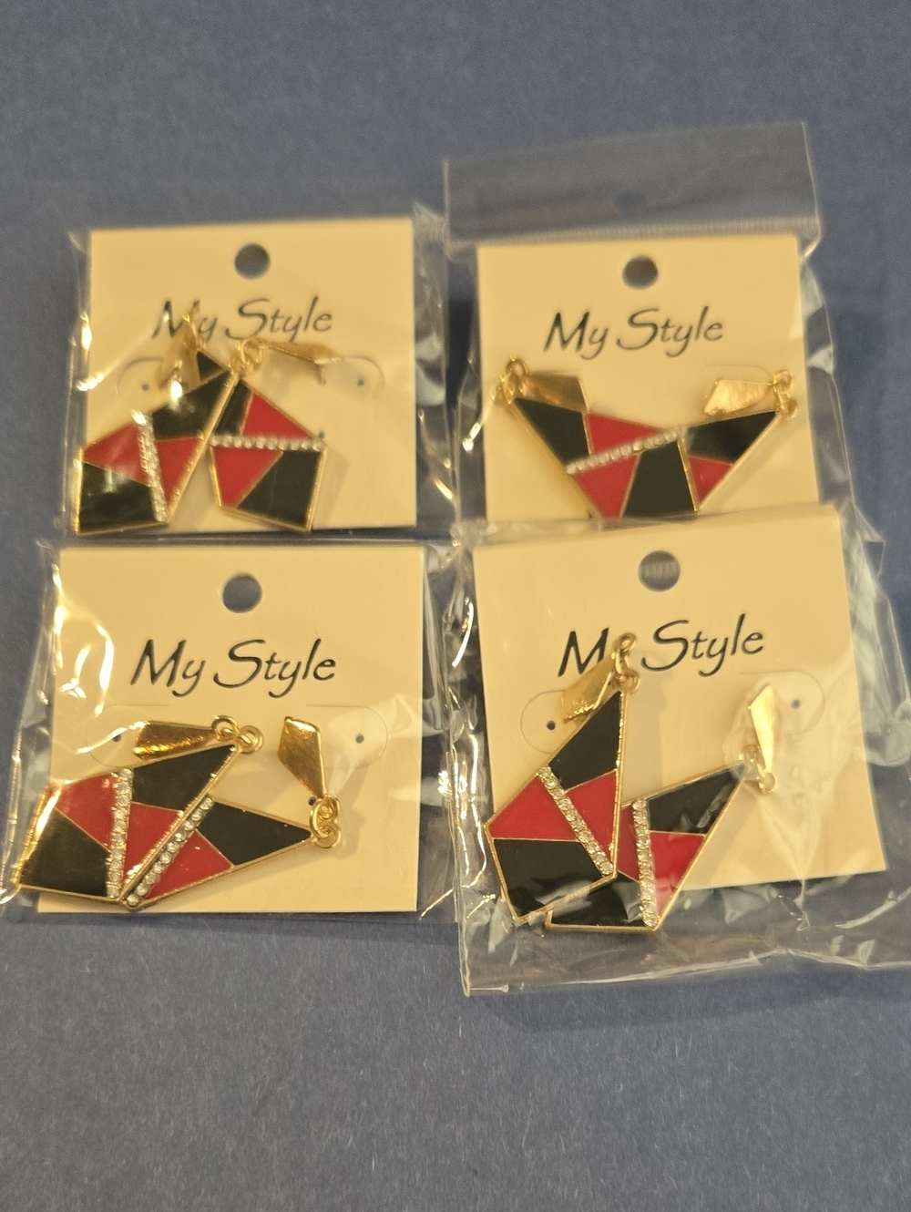 4 Pairs of Bold Statement Earrings.